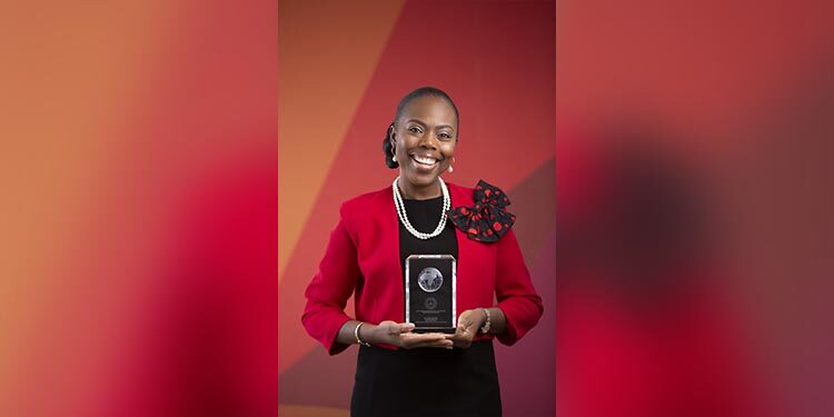 MD of Absa Bank Ghana, Abena Osei-Poku holding her award