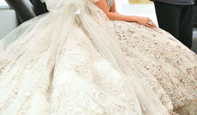 Here’s Jennifer Lopez Wearing The Most Extra Bejeweled Wedding Dress