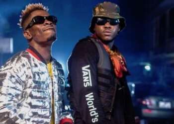 Shatta Wale Tattoos Medikal’s Initials on Arm