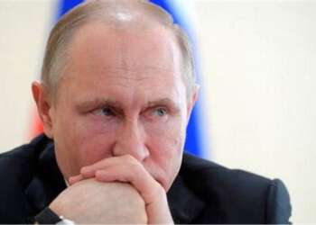 ‘We know that (Russian forces) have not made the progress that they wanted to make, particularly in the north. They have been frustrated by what they have seen is a very determined resistance,’ the official said, without providing evidence. The Kremlin said Putin had ordered troops to stop advancing on Friday but they were moving forwards again on Saturday after Kyiv refused to negotiate. Hacking collective Anonymous declares 'cyber war' against Vladimir Putin's government before announcing they have 'taken down' website of Kremlin-backed TV channel RT Hacking group Anonymous has declared 'cyber war' against Vladimir Putin's government after he mounted a full-scale invasion of Ukraine. The elusive computer experts issued the stark announcement on their Twitter account on Thursday evening. They said shortly before 10pm: 'The Anonymous collective is officially in cyber war against the Russian government.' Around 30 minutes later, they announced that they had taken down the website of the Kremlin-backed TV channel RT, which broadcasts in Britain and has been heavily criticised for its coverage. The cyber war declaration raises the prospect that Russia could be subjected to systematic hacking attempts in the coming days. An adviser to Zelensky denied that Kyiv had refused negotiations but said Russia had attached unacceptable conditions. He also said it was untrue that Russia had paused troop movements on Friday. Turkish President Tayyip Erdogan, who has fostered good ties with Russia and Ukraine, told Zelensky by phone on Saturday that Ankara was making efforts for an immediate ceasefire. Kyiv’s mayor Vitali Klitschko said there was currently no major Russian military presence in the capital, but that saboteur groups were active. The metro system serves now only as a shelter for citizens and trains have stopped running, he said. Klitschko said 35 people, including two children, had been wounded overnight and that he was extending an overnight curfew that kicked in at 5pm (1500 GMT). In an emotional speech to the besieged nation uploaded to Facebook on Friday, the Ukrainian President also accused Moscow of attempting to seize Kyiv, overthrow the government and install a ‘puppet’ regime ‘like in Donetsk’, one of two separatist regions which warmonger Vladimir Putin officially recognised before launching an all-out invasion. Declaring ‘we derailed their idea’, Zelensky added: ‘The fights are going on in many cities and areas of our state. But we know that we are protecting the country, the land, the future of our children. Kyiv and key cities around the capital are controlled by our army. ‘The [Russian] occupants wanted to block the centre of our state and put here their marionette, like in Donetsk. We derailed their idea.’ Zelensky pushed for Ukraine’s urgent ascension to the European Union, saying he discussed the issue with the EU leaders. He also urged cutting Russia from the SWIFT international electronic bank payment system, noting that Germany and Hungary should show ‘courage’ and agree to the move. Briefly switching to Russian, he claimed that thousands of Kremlin troops were killed and hundreds of those who were taken prisoner ‘can’t understand why they were sent into Ukraine to kill and get killed’. Thanking Russians who spoke out against the war and asked them to keep up the pressure on the Kremlin, he said: ‘The sooner you say to your government that this war should be immediately stopped, the more of your people will stay alive.’ After Ukrainian forces said they had fought off a Russian attack on their capital Saturday, Zelensky shot a selfie-style video outside his office to vow to stay and fight on. He also denounced as disinformation allegations that he had surrendered or fled. Wearing olive green military-style clothing and looking tired but determined, he added: ‘A lot of fake information has appeared on the internet saying that I allegedly called on our army to lay down its arms and that evacuation is underway. Our truth is that this is our land, our country, our children and we will protect all of this. This is what I wanted to tell you. Glory to Ukraine!’. As the video hit social media platforms, the sounds of explosions and air raid sirens could still be heard around the capital, as the Russian military said it had fired cruise missiles at Ukrainian military targets.