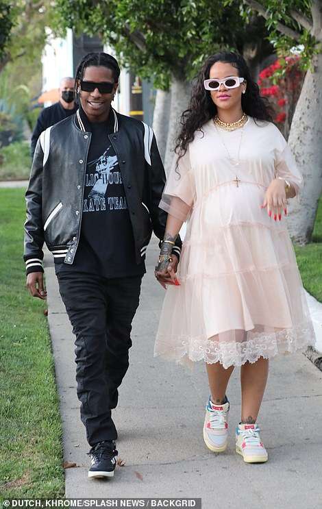 Rihanna glows in pink lace dress while shopping with beau A$AP Rocky in LA