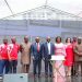 Dr. Alhaji Mahamudu Bawumia (7th from left) with Dr. Tony Oteng-Gyasi (6th from left), Barbara Oteng-Gyasi (7th from left), some Deputy Ministers, and the Board and Management of TCCL