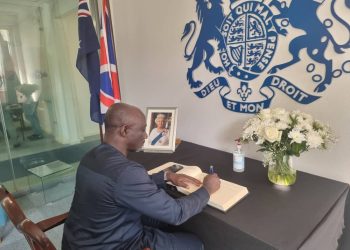 The Director-General of SIGA signs book of condolence- Queen Elizabeth II  
