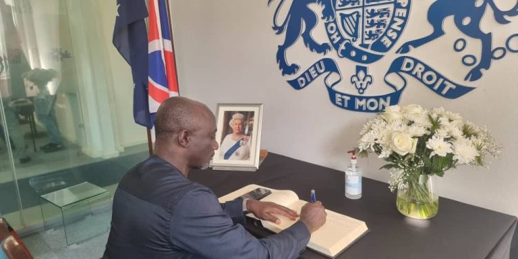 The Director-General of SIGA signs book of condolence- Queen Elizabeth II  