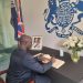 The Director-General of SIGA signs book of condolence- Queen Elizabeth II  