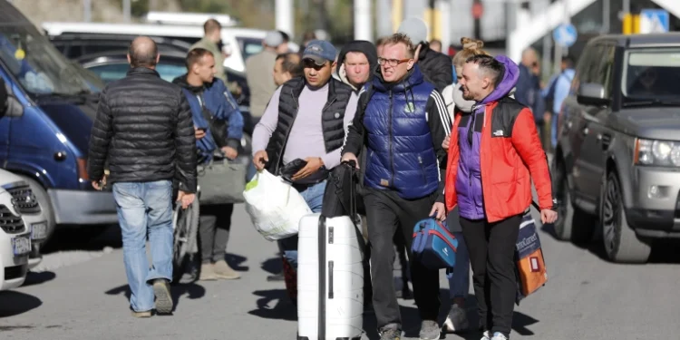 Protests and a 'Mass Exodus' in Russia; Thousands flee Russia to avoid enlistment