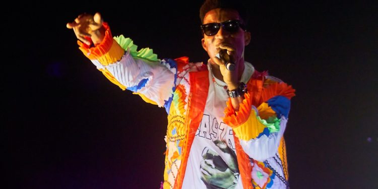 Kofi Kinaata performing at Afrochella, Photographed by CaxyConcepts