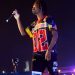 Kwesi Arthur in Free The Youth outfit at Afrochella. Photograhed by CaxyConcepts