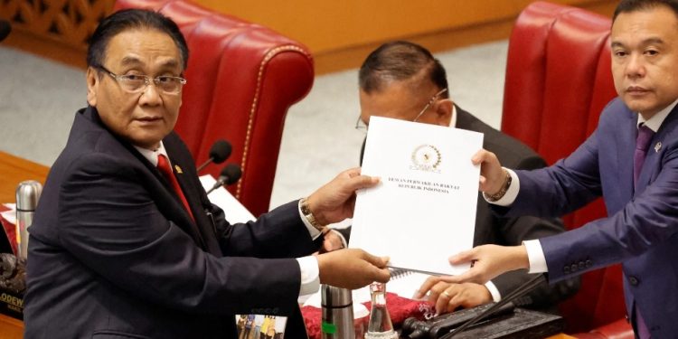 Indonesia passes criminal code banning sex outside marriage