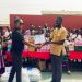 Country Manager of Silverbird Cinemas Ghana, Funmi Onuma presenting items to Edward Honest Polley, Administrator of Savior Children Foundation