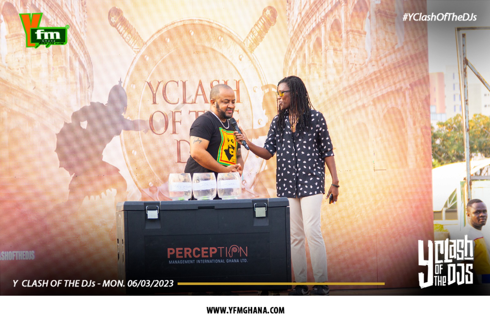 Y 107.5 FM, Accra Representative on stage with host AJ Ahenkan 