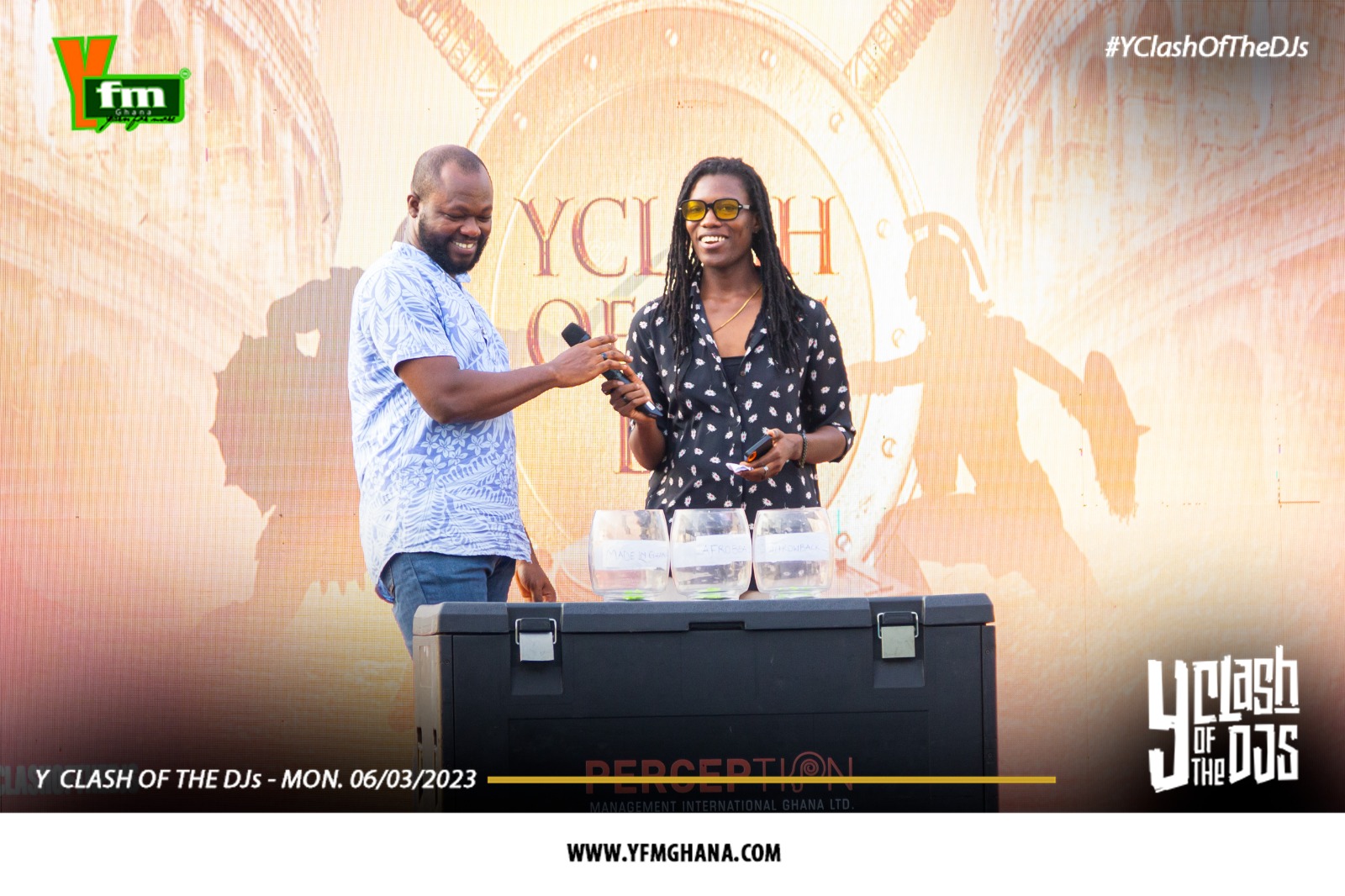 Y 97.9 FM, Takoradi Representative on stage with host AJ Ahenkan 