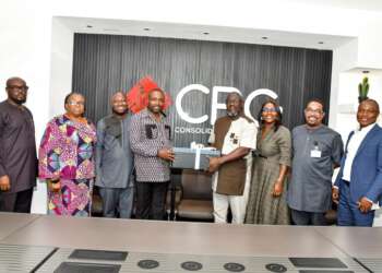 Mr Boadu (third from left) receiving souvenirs from Mr Daniel Addo, CBG MD
