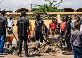 AratheJay leads community cleanup in Tema following "The Odyssey" release